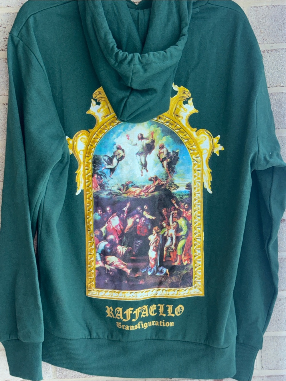 rebels Green Hoodie with Gold-Frame Religious Graphic